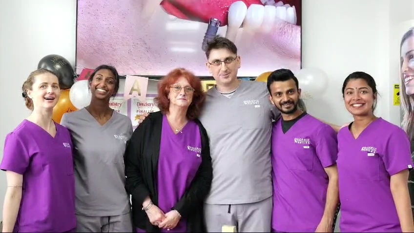 Iconic Smiles colleagues together in the practice